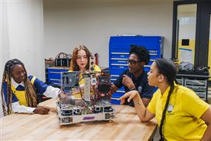 students working on a robot. 